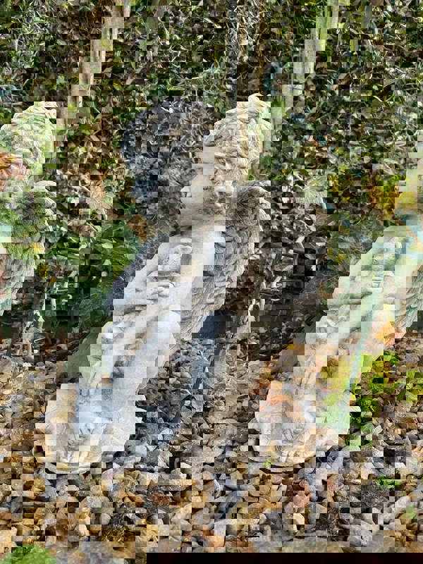 Stone Cast Cherub Ornament with Teddy on Hand