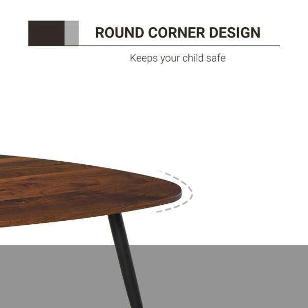 Close-up of walnut round tabletop with smooth corners and black tapered legs