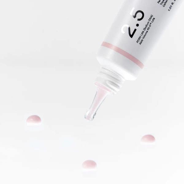 Soft pink emulsion texture of Abib PDRN Volume Fill-it Booster Crème melting clear and absorbing comfortably onto targeted expression lines at Atelier De Glow UK.