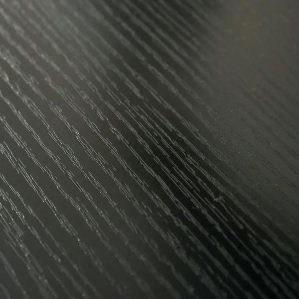 Black textured surface finish on monitor stand riser