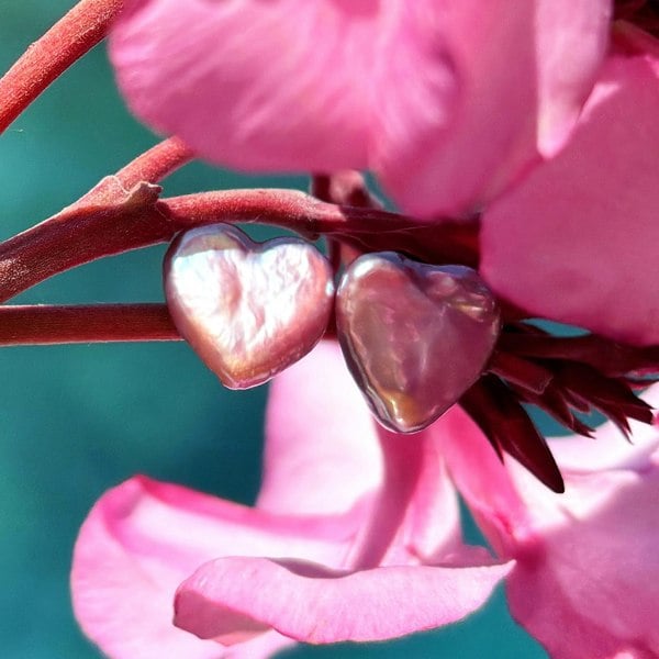Heart studs handcrafted by LENAE London, featuring real heart pearls.