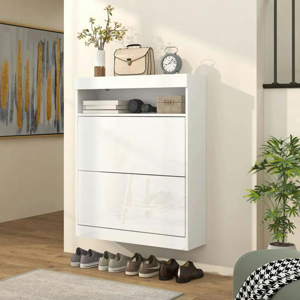 High-gloss white shoe storage cabinet with flip doors closed, shoes on base