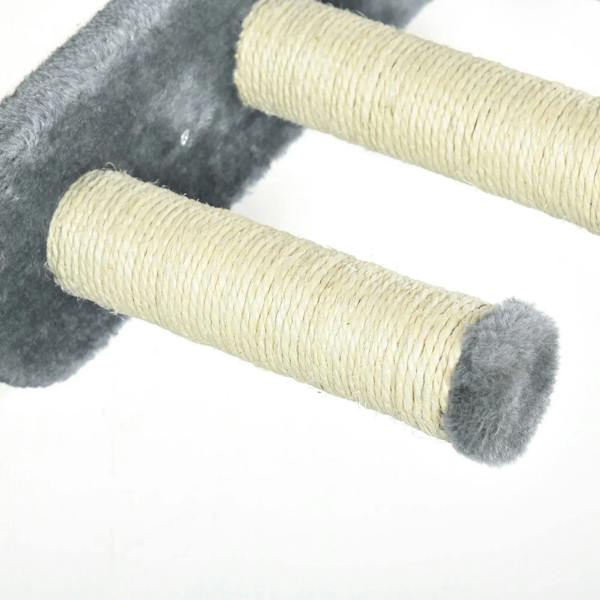 Close-up of grey plush scratching post with light rope-wrapped cylinder
