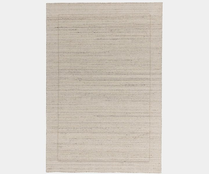 Larson Ivory luxury rug made from natural wool for modern, elegant interiors.