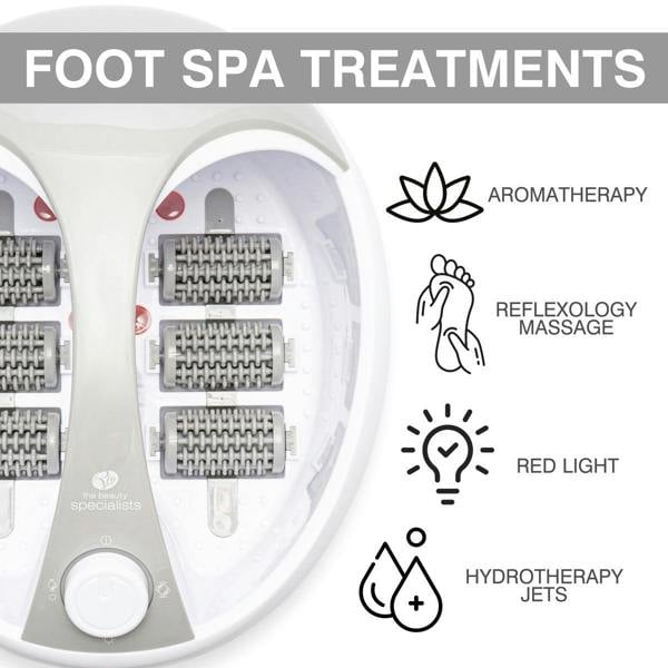Top view of the Rio Deluxe Foot Spa Bath and Massager with textured rollers. Icons on the right highlight aromatherapy, reflexology massage, red light, and hydrotherapy jets. A gray banner at the top reads Foot Spa Treatments.