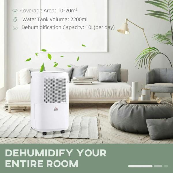 White portable dehumidifier with front vent and wheels placed on a living room floor