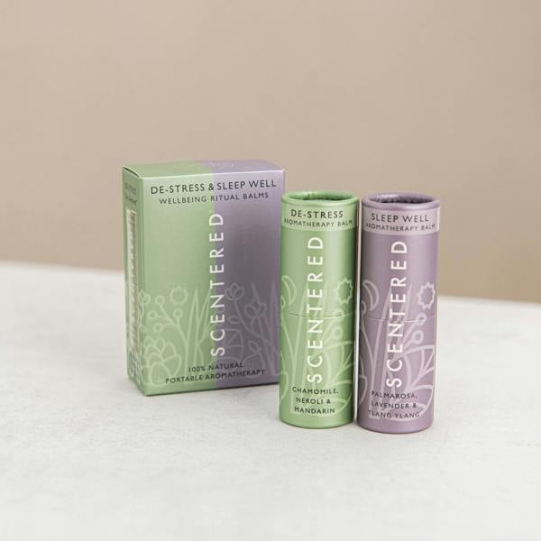 De-stress Balm and Sleep well Balm are displayed together with their packaging.
