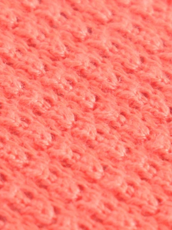 Raised texture open weave for knitted tie