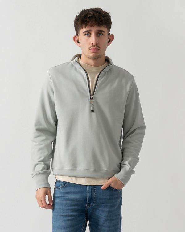 Studio shot of a model wearing a Parajumpers Broad Peak Mens 1/4 Zip Sweatshirt in Fresh Grey 271