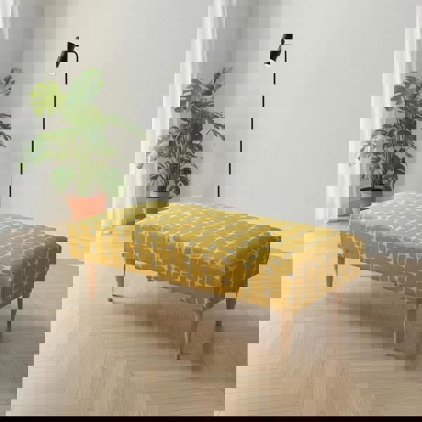 Multi functional padded coffee table with designer stitched top and storage