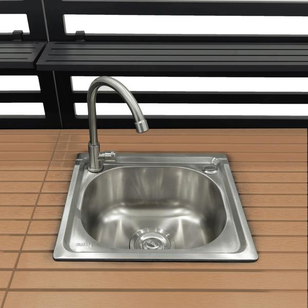 Stainless steel sink with a sleek faucet, set in a wooden countertop, ideal for outdoor kitchen use with a modern design