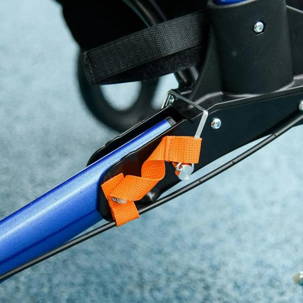 Close-up of orange strap and release hardware on a blue rollator walker frame