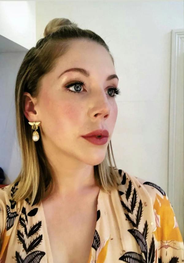 The earring worn by a model.