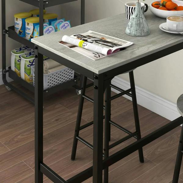 Industrial bar table with grey top and black frame, two-space shelf and stool underneath