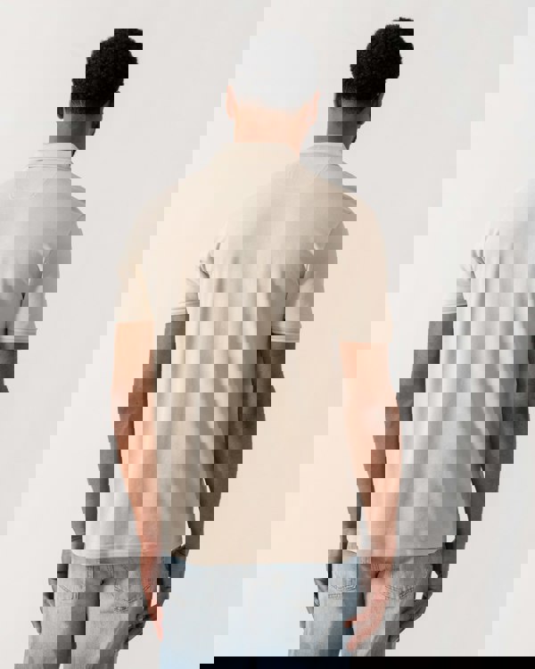 Model wearing BOSS Green Mens Paddy Cotton-Piqué Polo Shirt with Contrast Logo in Light Beige 275 - back