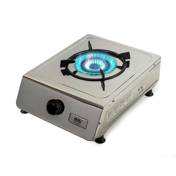 A single burner gas stove with a stainless steel finish and a visible blue flame.