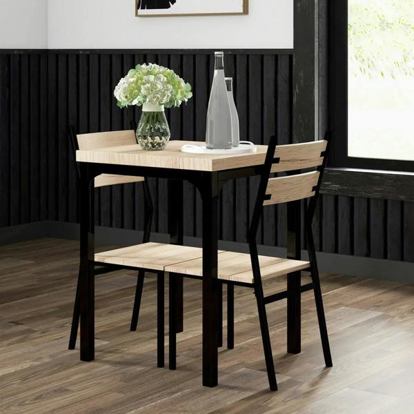 Dining table with two light wood chairs, black frames in a modern room
