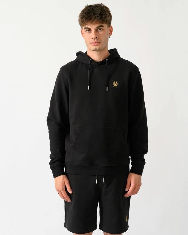 model wearing a Belstaff Mens Logo Hoodie in Black