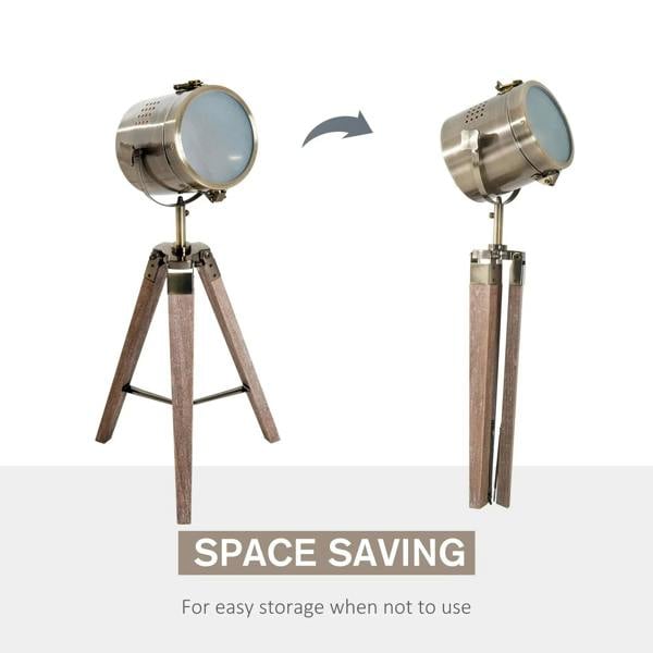 Tripod spotlight desk lamp with blue-tinted inner reflector on dark wood legs