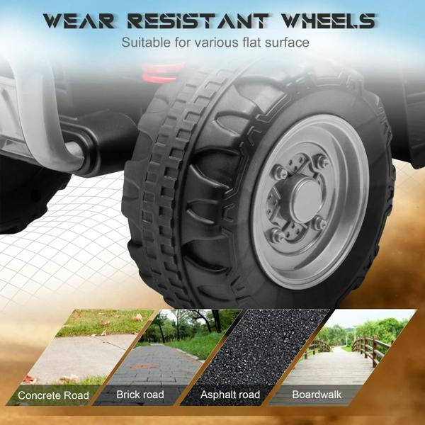 Black quad bike tires with deep tread and silver wheel hub