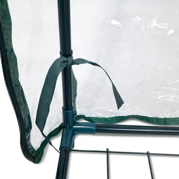 Close-up of the Mini Greenhouse 4 Tier with a clear plastic cover, featuring a green trim and tie for secure closure and stability