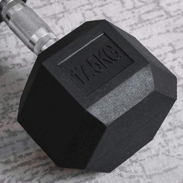 Close-up black hex rubber dumbbell head with 17.5kg marking