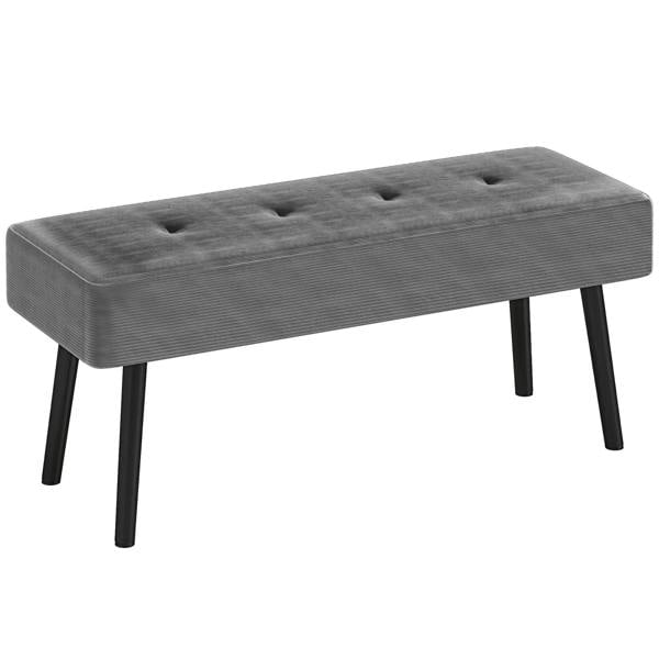 Grey corduroy end-of-bed bench with tufted top and thick padding, black steel legs