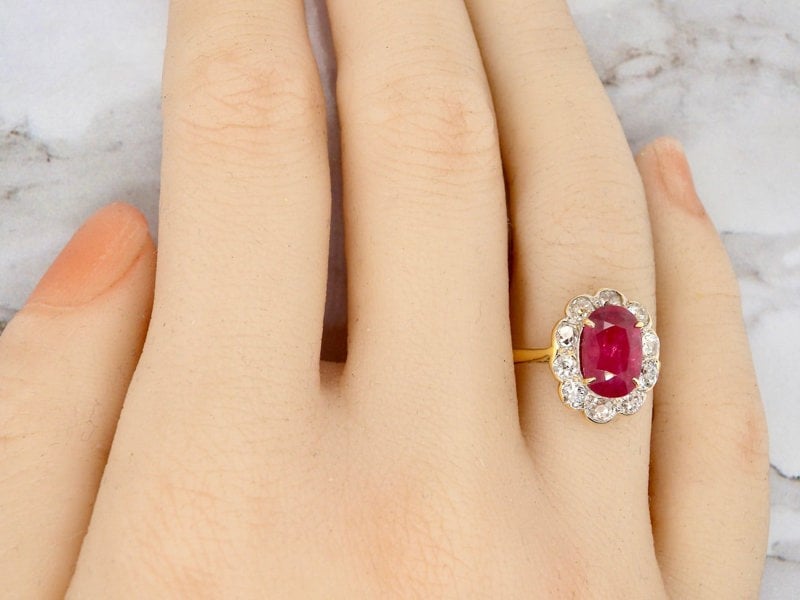 Vintage Tom A fine ruby and diamond cluster ring