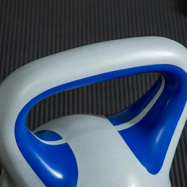12 kg kettlebell handle close-up with glossy blue grip on light grey body