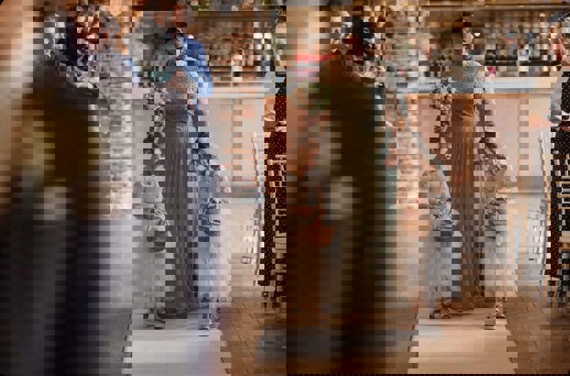 Young flower girls walking down the isle