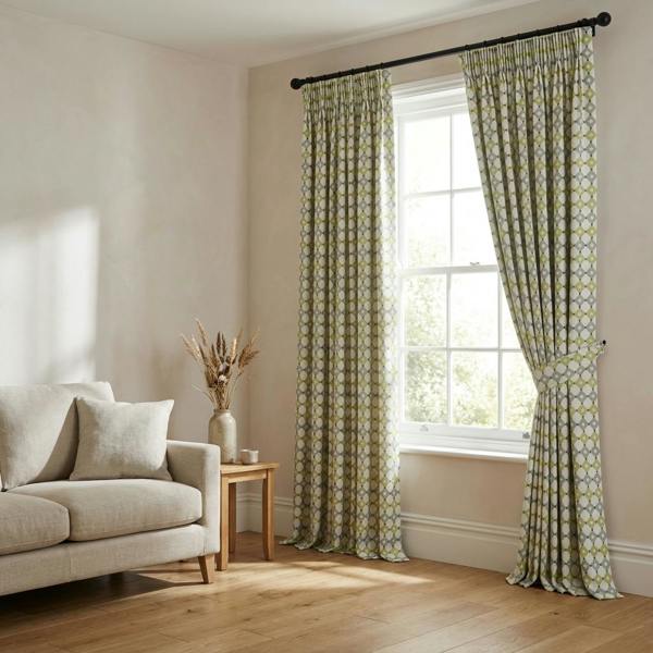 Florence made-to-measure curtains in Green, styled in a living room
