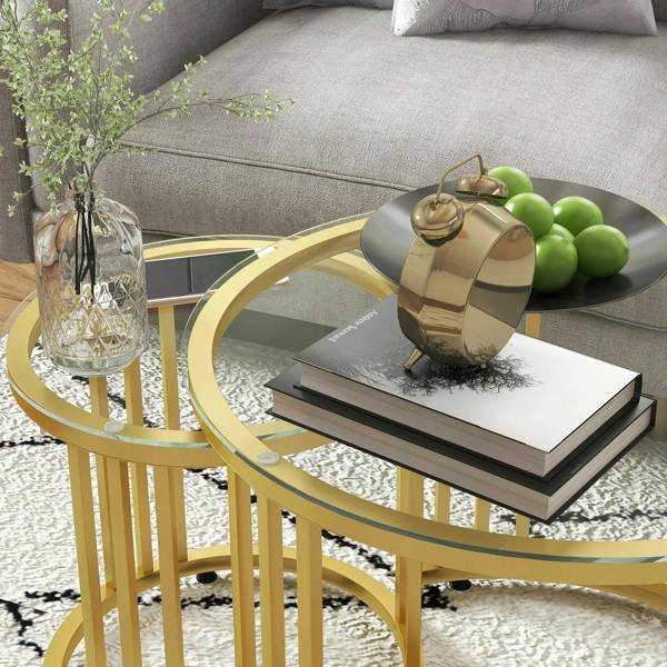 Gold round nesting table pair with clear tempered glass top and steel slatted sides