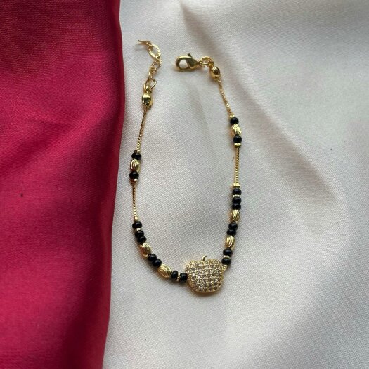 The Colourful Aura 18k Gold plated Black Bead Nazar Charm bracelet