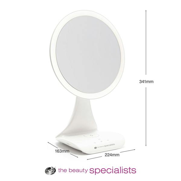 The Rio 5x magnification LED makeup mirror with wireless charging station features a white circular design, built-in stand, dimensions of 341mm tall, 224mm wide at the base, and 163mm deep, with the beauty specialists logo at the bottom.
