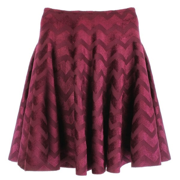 Alaia circular skater skirt in claret velvet with chevron patterning
