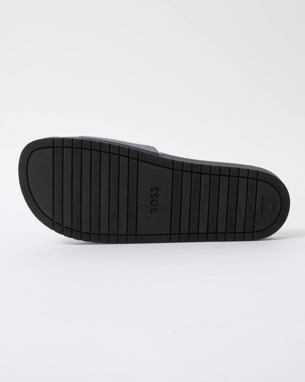 sole of BOSS Orange Aryeh Mens Italian-Made Slides With Large Logo Detail in Dark Blue 406