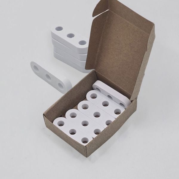 Shock cord tensioners