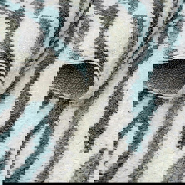 Moodi Shaggy Green Rug, abstract design, 30 mm plush pile | THE RUGS