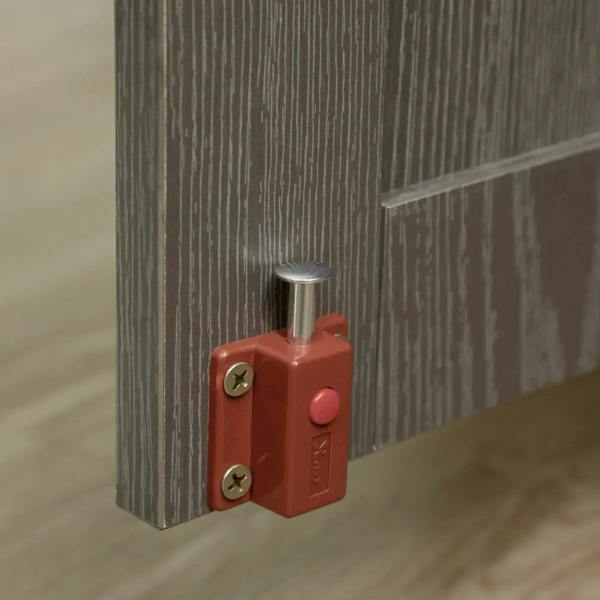 Grey dog crate table front latch and magnetic door lock detail on wooden panel