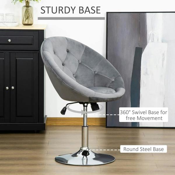 Grey swivel dressing stool with round steel base and button tufted padded seat