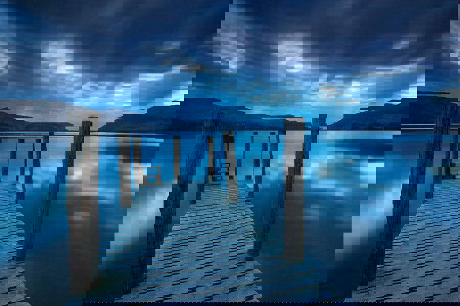 blue wall print of lake district jetty at derwent