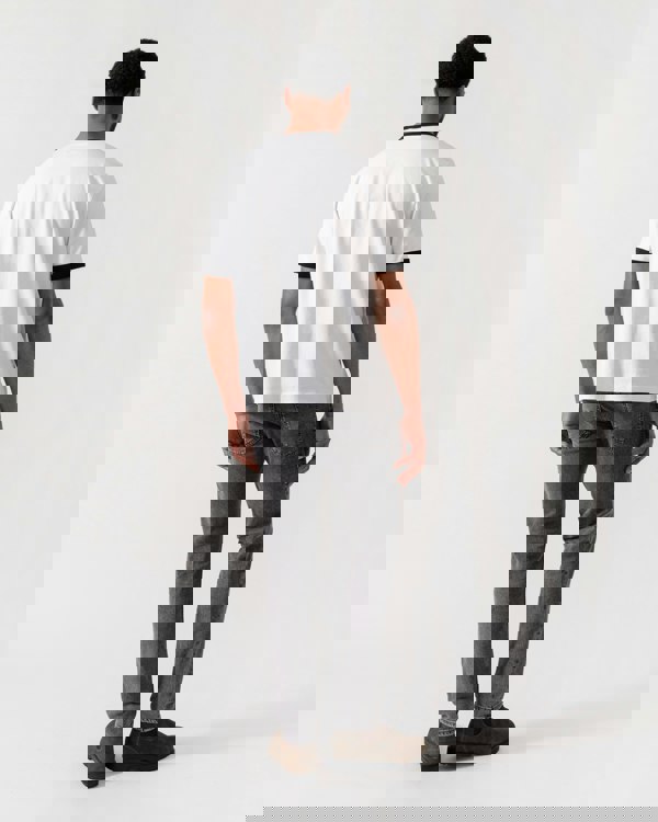 Model wearing HUGO Out-Of-Office T-Shirt in White 100 - back