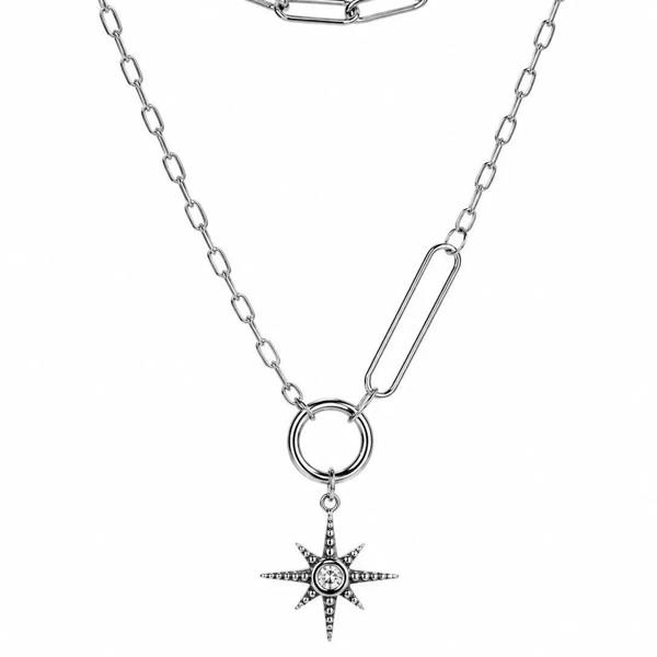 Silver chain necklace with a star-shaped pendant on a white background