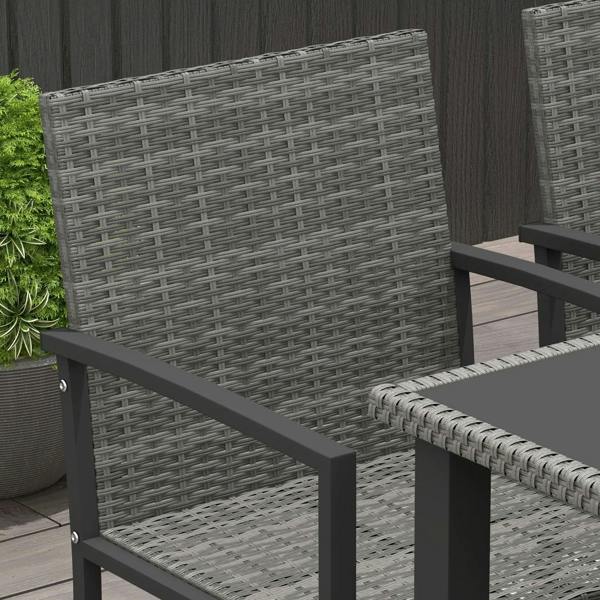 Close-up of grey woven dining chair back with dark steel arm frame