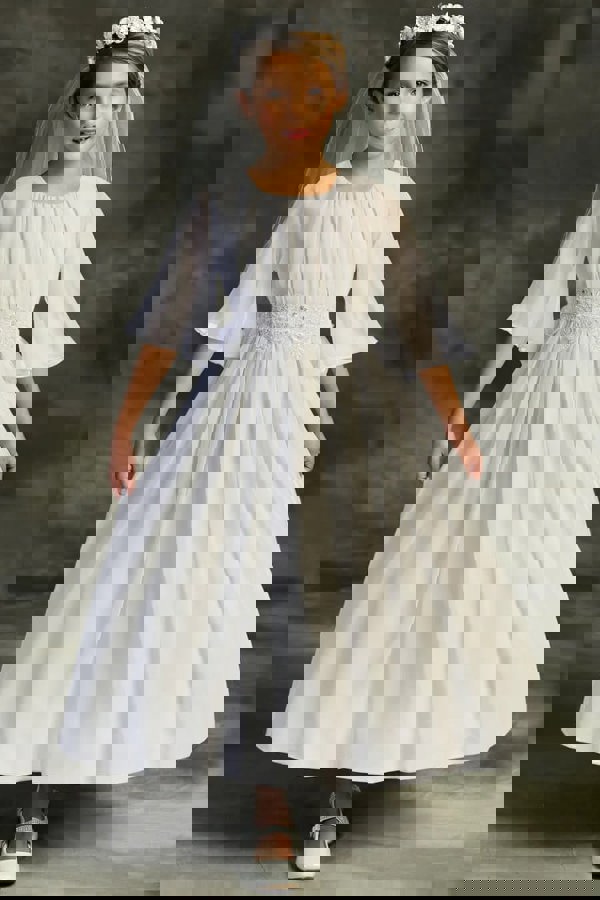 Young girl wearing communion dress