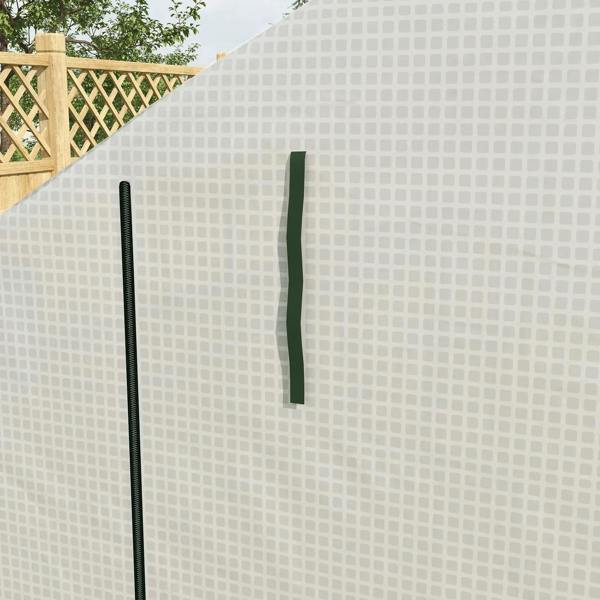 White walk-in greenhouse cover with green stability poles for secured frame.