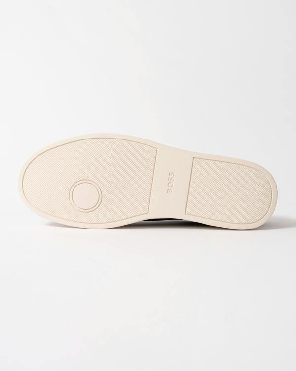 sole of BOSS Orange Kieran Mens Grained-leather trainers with rubber sole in Dark Blue 407