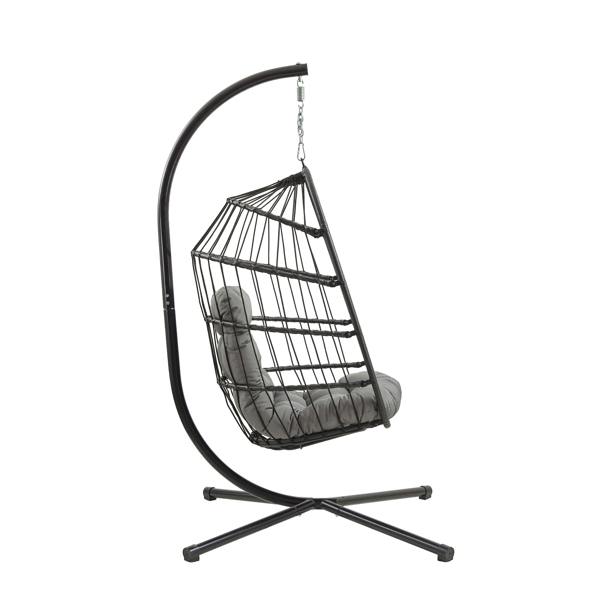 Stylish black rattan hanging egg chair with a curved metal stand and plush gray cushion, perfect for indoor or outdoor relaxation