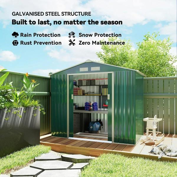Green metal storage shed with double doors open and interior shelving for organization