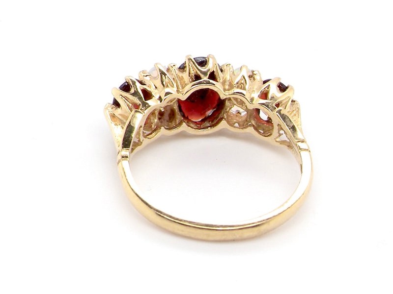 Vintage Tom An 18 carat gold garnet and opal dress ring